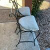 Pair of Bar Stools with Upholstered Seats and Metal Backs side