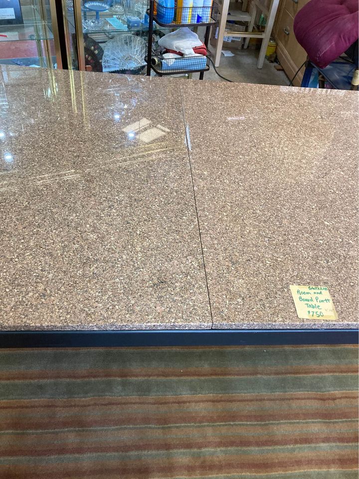 Room and Board Granite and Metal Dining Table surface