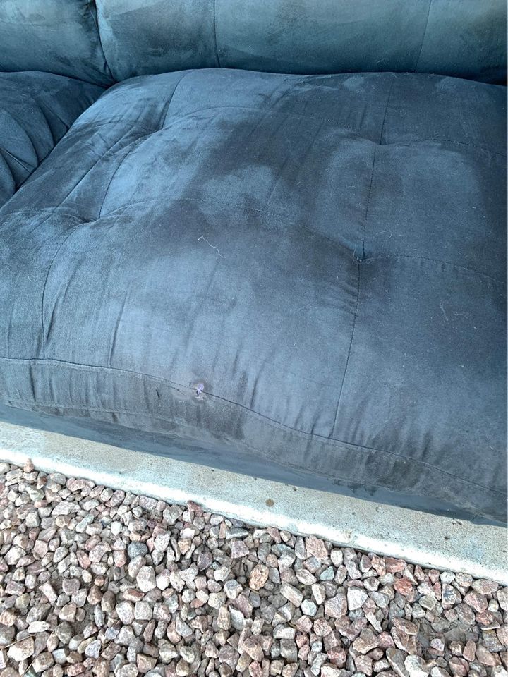Small Black Sofa damage