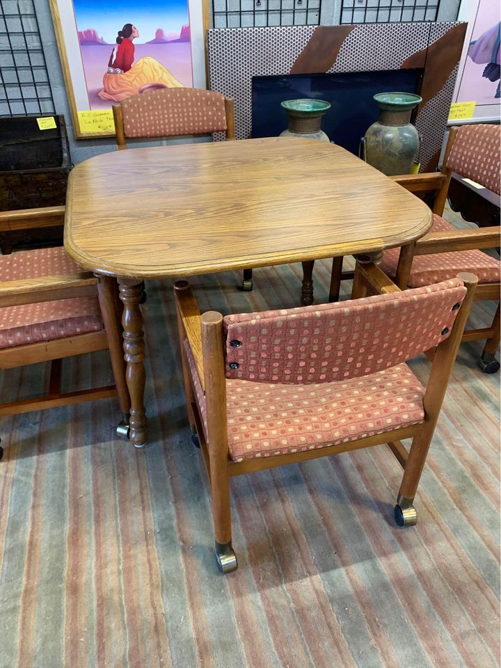 Dining Table and 4 Wheeled Chairs chair back