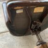 2 Mid-Century Office Chairs brown chair bottom