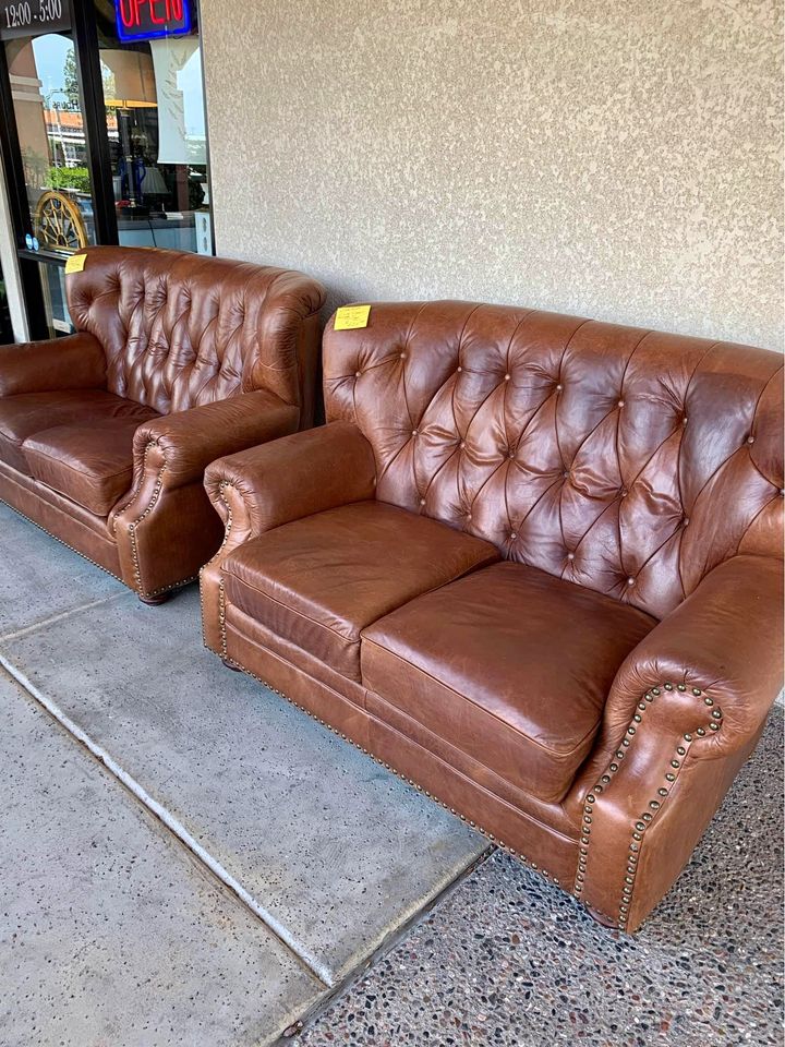 Pair of Tufted Leather Loveseats