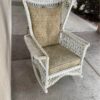 White Wicker Rocker with Magazine Holder Armrest