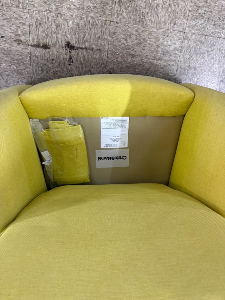 Crate and Barrel Yellow Swivel Rocker Armchair no cushion Crate and Barrel Yellow Swivel Rocker Armchair