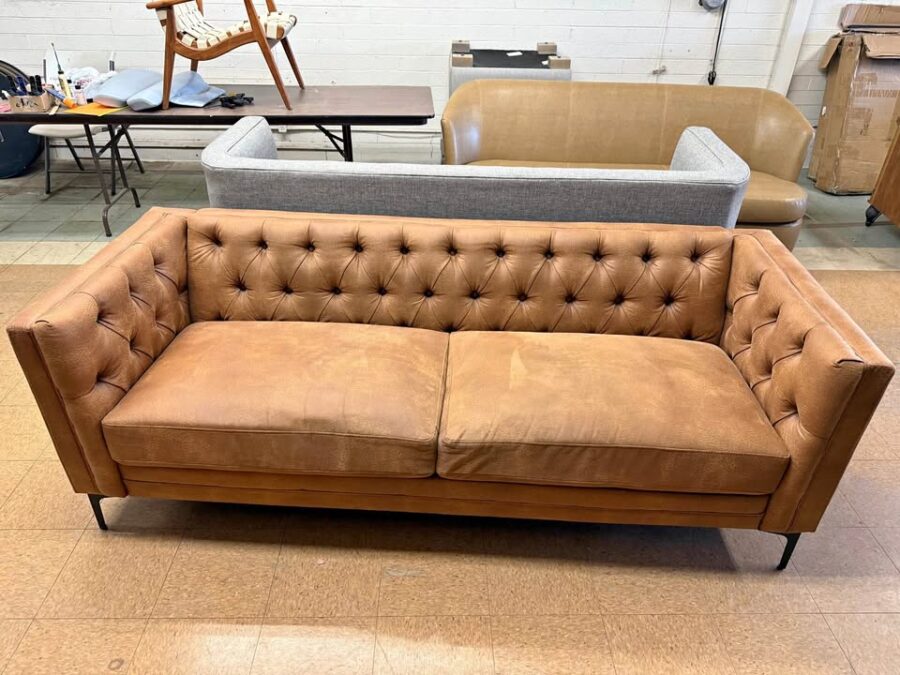 camel color tufted sofa